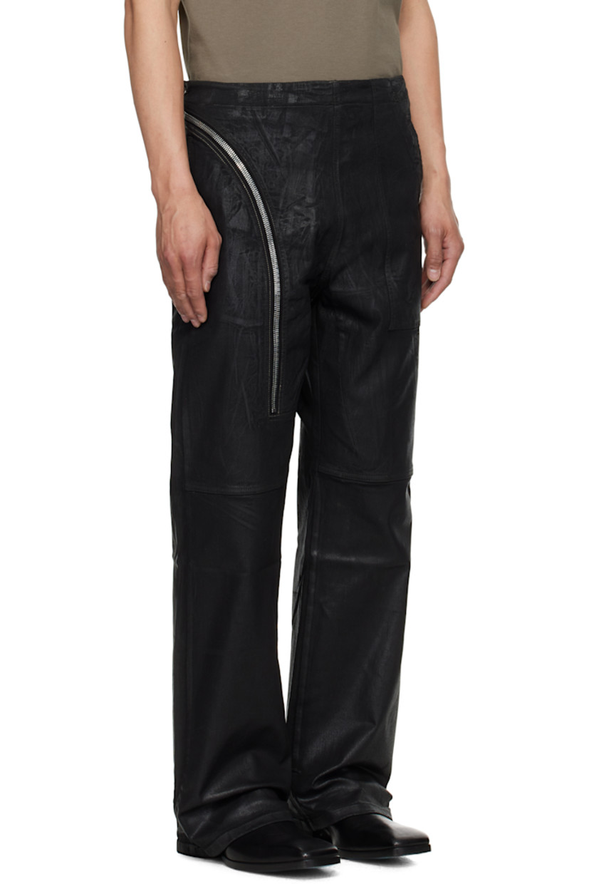 Overdyed and foil-coated 10 oz stretch denim jeans.

· ZDHC-certified
· Layered construction
· Belt loops
· Five-pocket styling
· Concealed zip fly
· Zip panel extends to back waistband
· Silver-tone hardware

Each item is unique. Please note finishings and colorations may vary.

Supplier color: Black