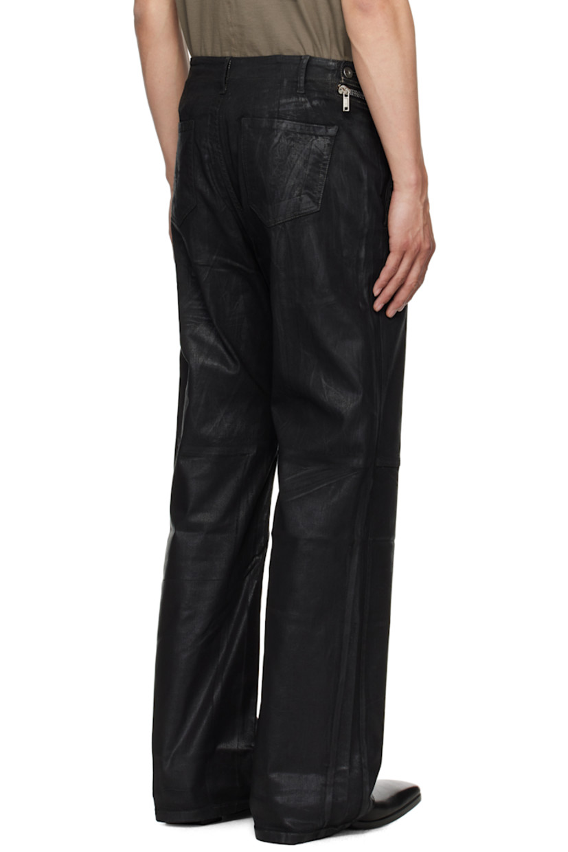 Overdyed and foil-coated 10 oz stretch denim jeans.

· ZDHC-certified
· Layered construction
· Belt loops
· Five-pocket styling
· Concealed zip fly
· Zip panel extends to back waistband
· Silver-tone hardware

Each item is unique. Please note finishings and colorations may vary.

Supplier color: Black