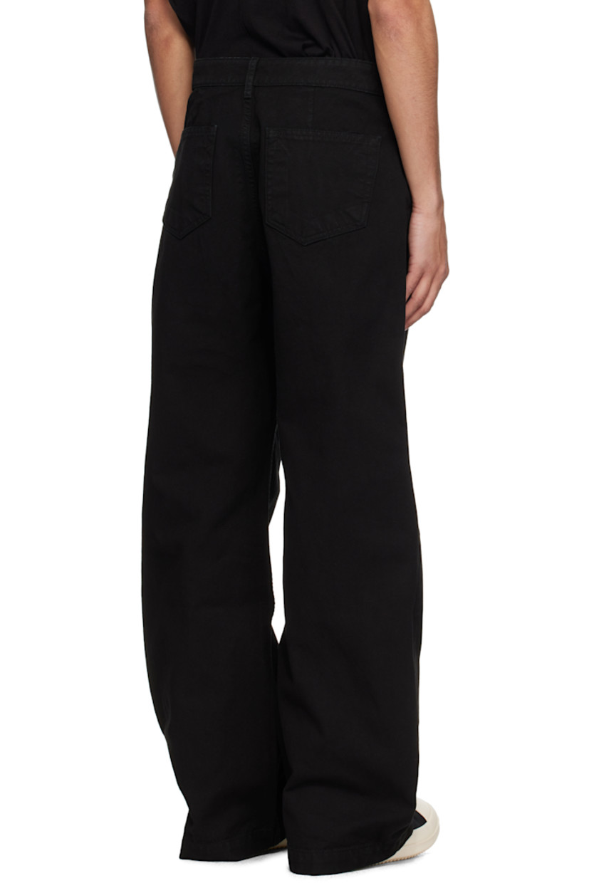 GOTS-certified organic cotton canvas jeans.

· Garment-dyed
· Wide-leg
· Mid-rise
· Belt loops
· Five-pocket styling
· Zip fly
· Whiskering at front
· Silver-tone hardware

Supplier color: Black