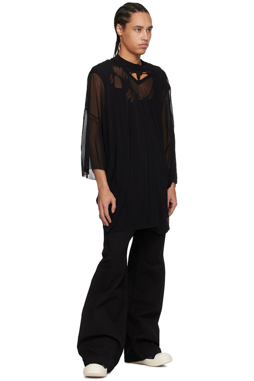 GOTS-certified organic cotton canvas jeans.

· Garment-dyed
· Wide-leg
· Mid-rise
· Belt loops
· Five-pocket styling
· Zip fly
· Whiskering at front
· Silver-tone hardware

Supplier color: Black