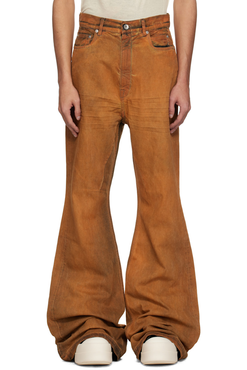 Overdyed 13 oz stretch selvedge denim jeans. Fading and whiskering throughout.

· ZDHC-certified denim
· Slim-fit and flared
· High-rise
· Belt loops
· Six-pocket styling
· Zip fly
· Extended hem
· Silver-tone hardware

Supplier color: Orange