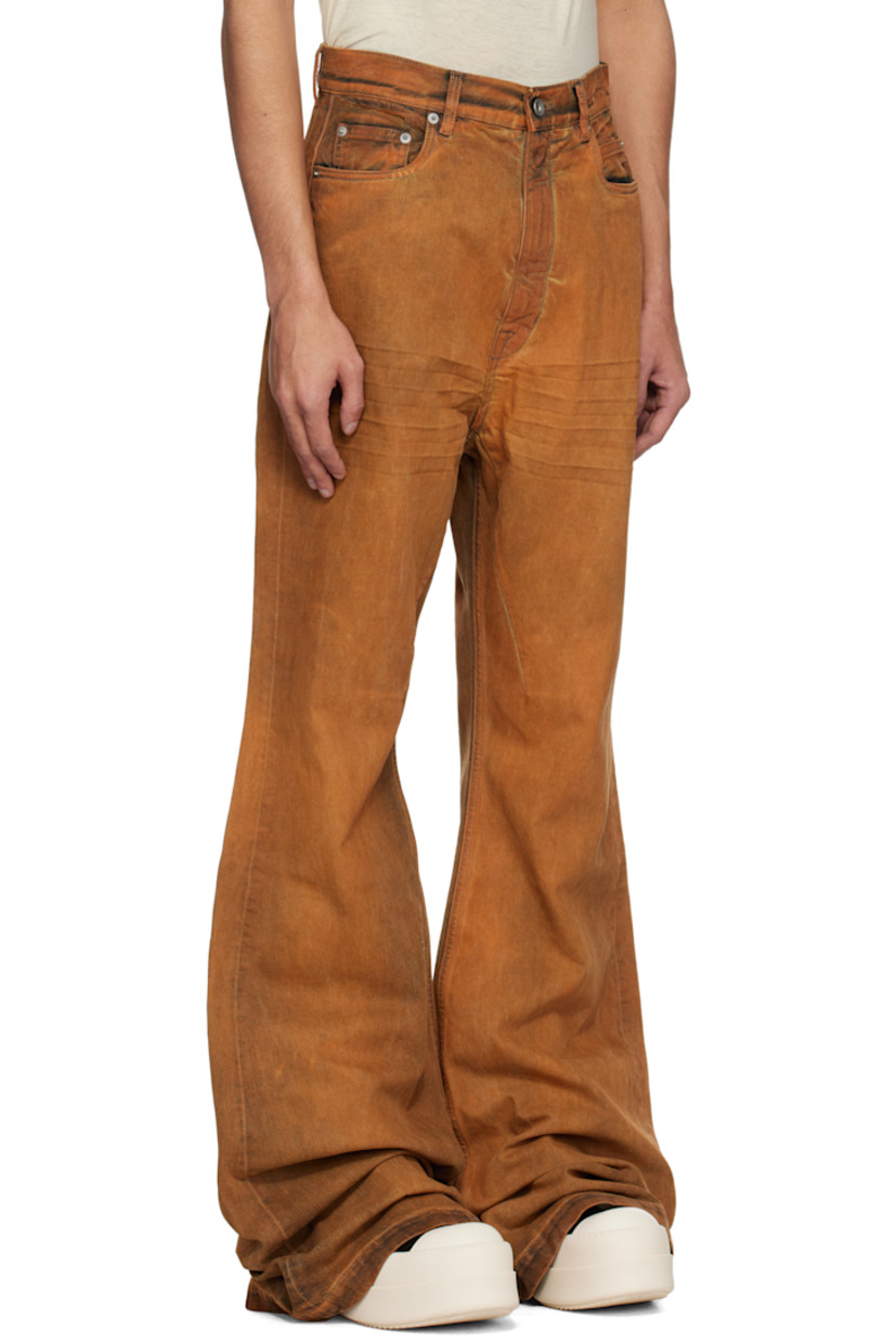 Overdyed 13 oz stretch selvedge denim jeans. Fading and whiskering throughout.

· ZDHC-certified denim
· Slim-fit and flared
· High-rise
· Belt loops
· Six-pocket styling
· Zip fly
· Extended hem
· Silver-tone hardware

Supplier color: Orange