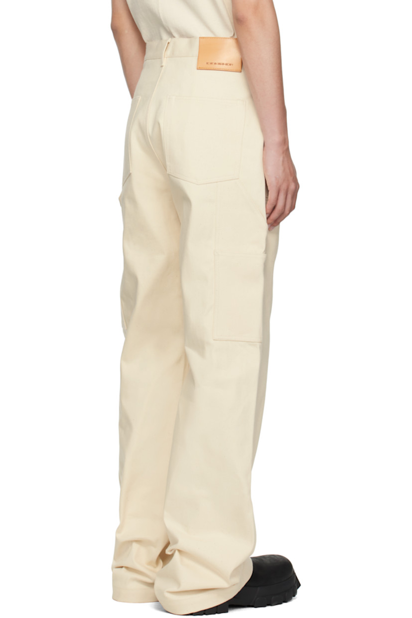 Heavyweight 16 oz non-stretch denim jeans.

· Wide-leg
· Low-rise
· Belt loops
· Six-pocket styling
· Button fly
· Patch pockets at outseam
· Hammer loop and patch pocket at outseam
· Logo patch at back waistband

Supplier color: Natural
