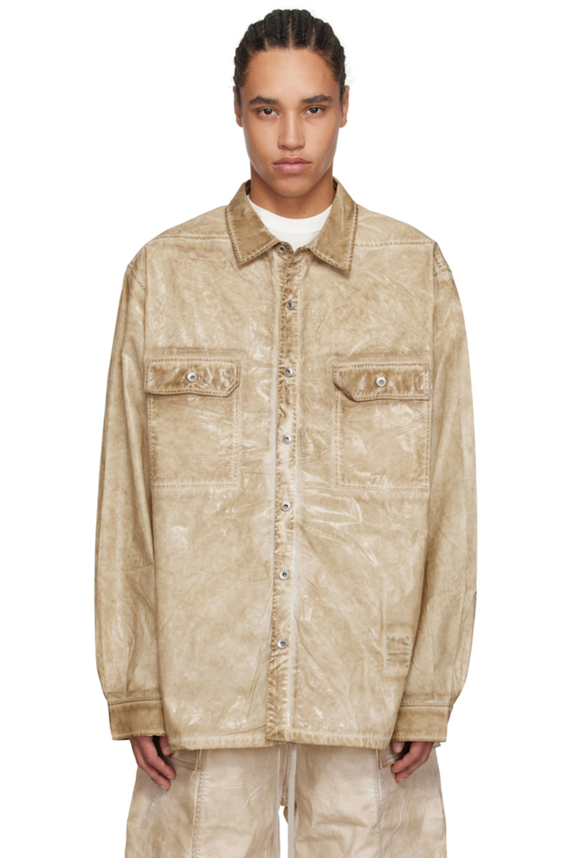Foil-coated GOTS-certified organic cotton poplin shirt. Fading, smudging, and creases throughout.

· Garment-dyed
· Oversized
· Spread collar
· Button closure
· Flap pockets
· Saddle shoulders
· Adjustable button fastening at cuffs
· Integrated logo-woven strap at interior
· Silver-tone hardware

Each item is unique. Please note finishings may vary.

Supplier color: Parchment
