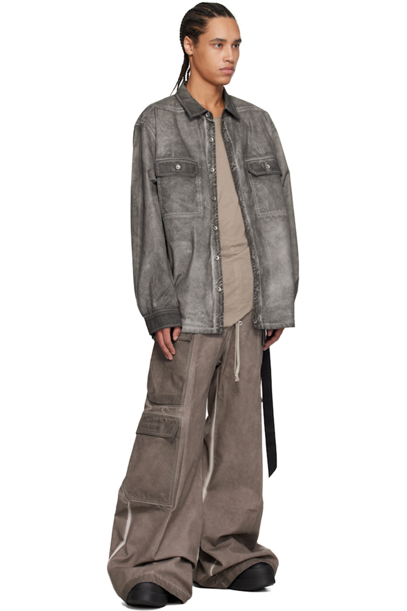 Foil-coated GOTS-certified organic cotton poplin shirt. Fading and creases throughout.

· Garment-dyed
· Oversized
· Spread collar
· Button closure
· Flap pockets
· Saddle shoulders
· Adjustable button fastening at cuffs
· Integrated logo-woven strap at interior
· Silver-tone hardware

Each item is unique. Please note finishings may vary.

Supplier color: Darkdust