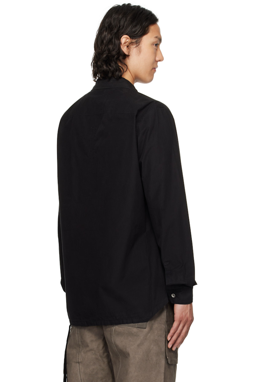 GOTS-certified organic cotton poplin overshirt.

· Garment-dyed
· Spread collar
· Button closure
· Flap pockets
· Droptail hem
· Beveled side seams
· Saddle shoulders
· Adjustable button fastening at cuffs
· Integrated logo-woven strap at interior
· Silver-tone hardware

Supplier color: Black