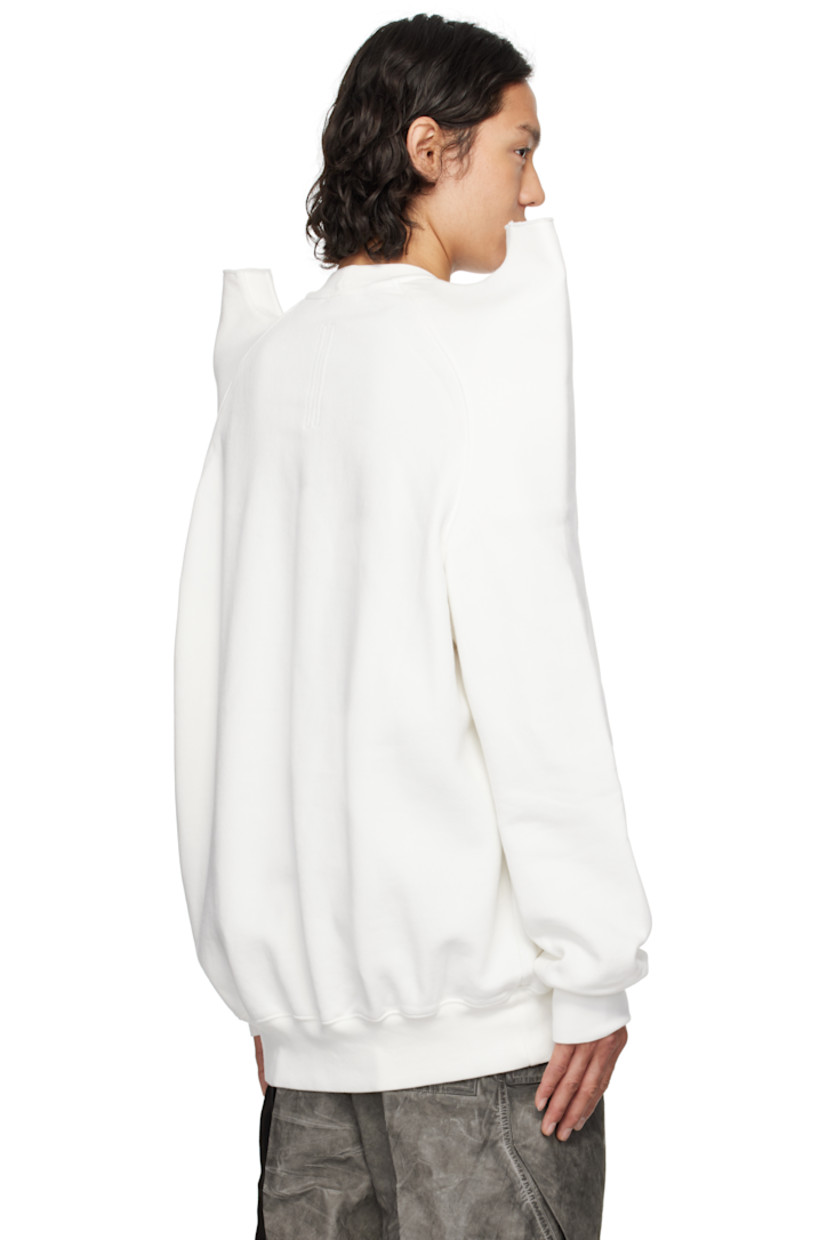Heavyweight GOTS-certified organic cotton fleece sweatshirt.

· Rib-knit crewneck, hem, and cuffs
· Cutout with raw edge at pagoda shoulders
· Raglan sleeves
· Integrated logo-woven strap at interior

Supplier color: Milk