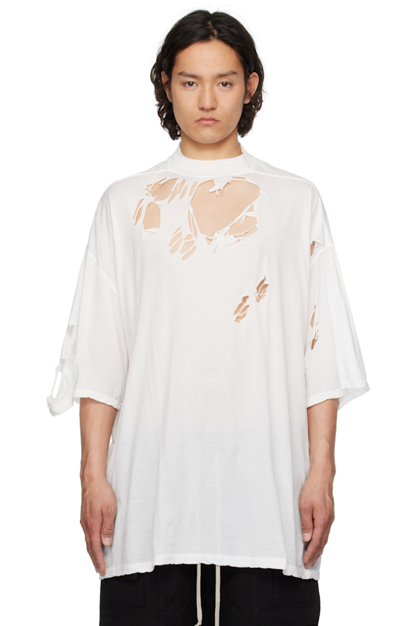 Lightweight GOTS-certified organic cotton gauze jersey T-shirt. Distressing throughout.

· Oversized
· Rib-knit crewneck
· Dropped shoulders
· Central seam at back
· Integrated logo-woven strap at interior

Supplier color: Milk