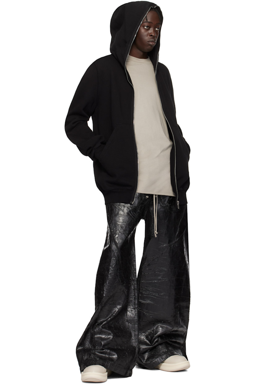 High-top grained leather sneakers in off-white.

· Perforated detailing throughout
· Lace-up closure
· Logo patch at padded tongue
· Padded collar
· Logo cutout at sides
· Buffed faux-leather lining
· Treaded rubber platform sole
· Platform: H2"

Part of the Rick Owens DRKSHDW x Converse collaboration.

Supplier color: Oyster/White