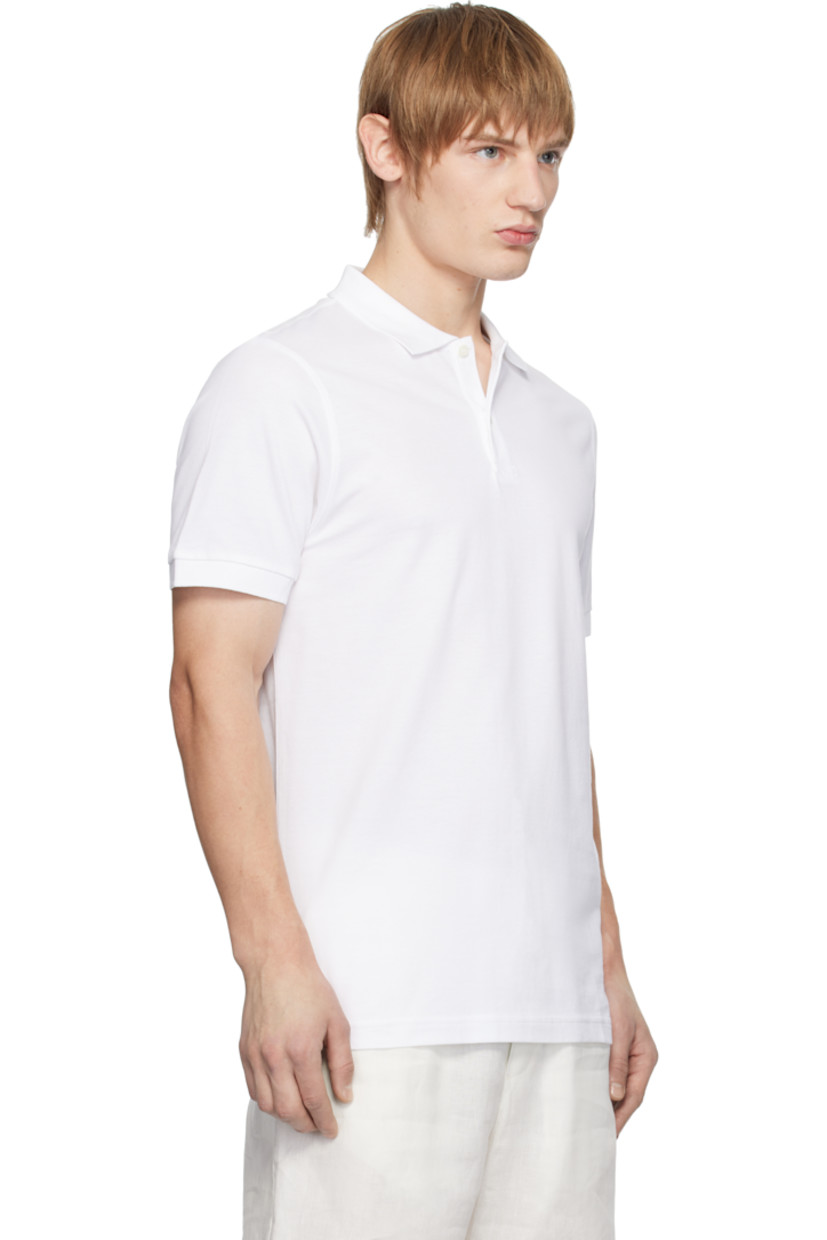 Supima cotton piqué polo. 

· Rib-knit spread collar and cuffs
· Two-button placket
· Tennis-tail hem
· Logo-engraved shell hardware

Supplier color: White
