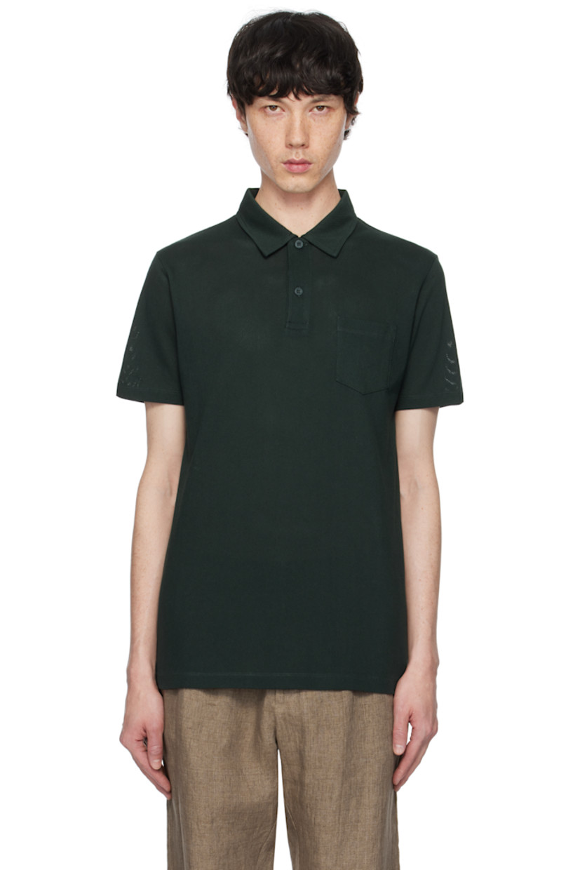 Lightweight extra-long staple supima cotton mesh polo. 

· Spread collar
· Two-button placket
· Patch pocket
· Vented side seams

Supplier color: Holly green
