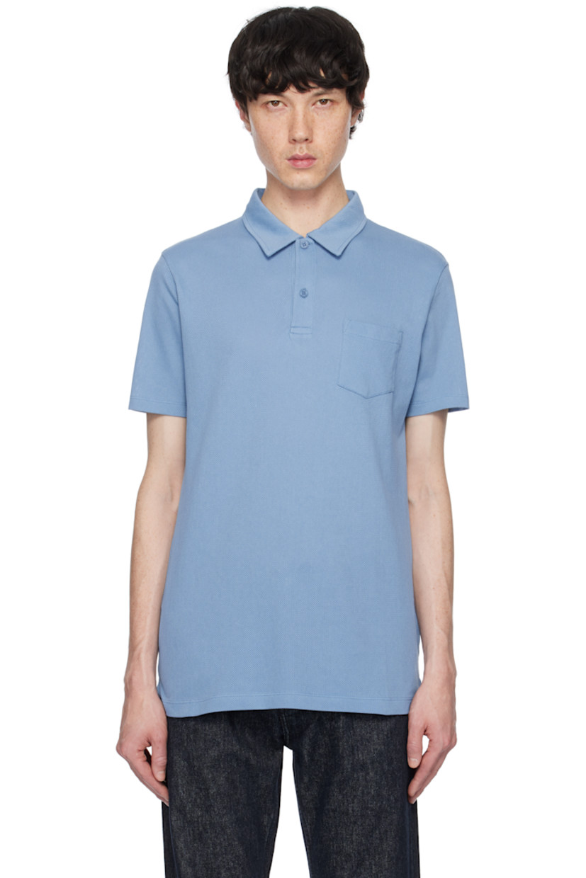 Lightweight extra-long staple supima cotton mesh polo. 

· Spread collar
· Two-button placket
· Patch pocket
· Vented side seams

Supplier color: Como blue