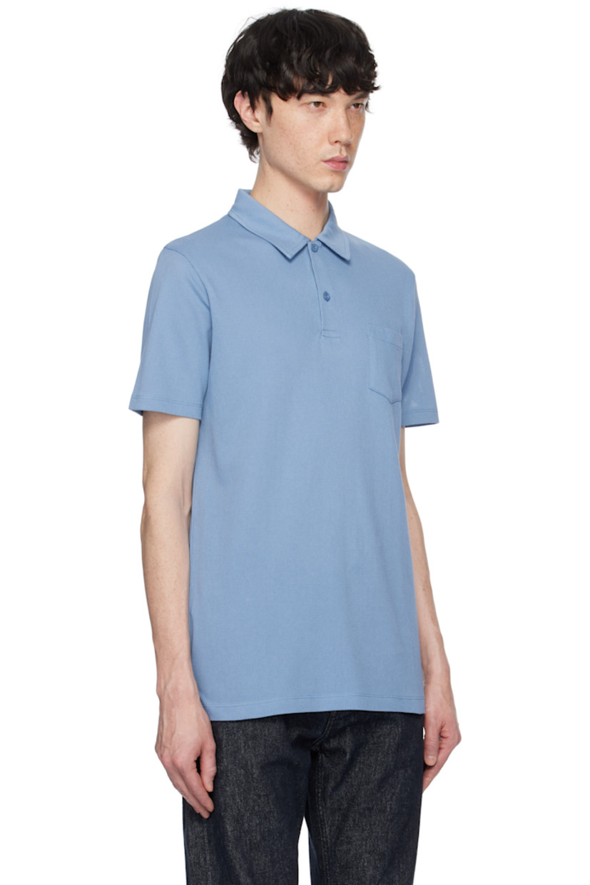 Lightweight extra-long staple supima cotton mesh polo. 

· Spread collar
· Two-button placket
· Patch pocket
· Vented side seams

Supplier color: Como blue