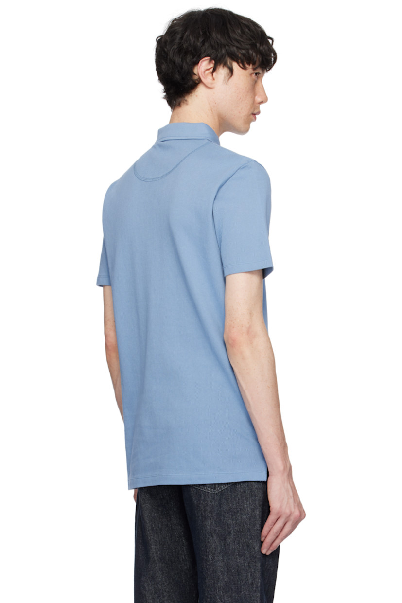 Lightweight extra-long staple supima cotton mesh polo. 

· Spread collar
· Two-button placket
· Patch pocket
· Vented side seams

Supplier color: Como blue