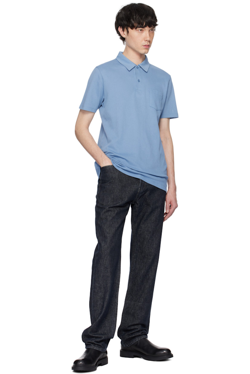 Lightweight extra-long staple supima cotton mesh polo. 

· Spread collar
· Two-button placket
· Patch pocket
· Vented side seams

Supplier color: Como blue
