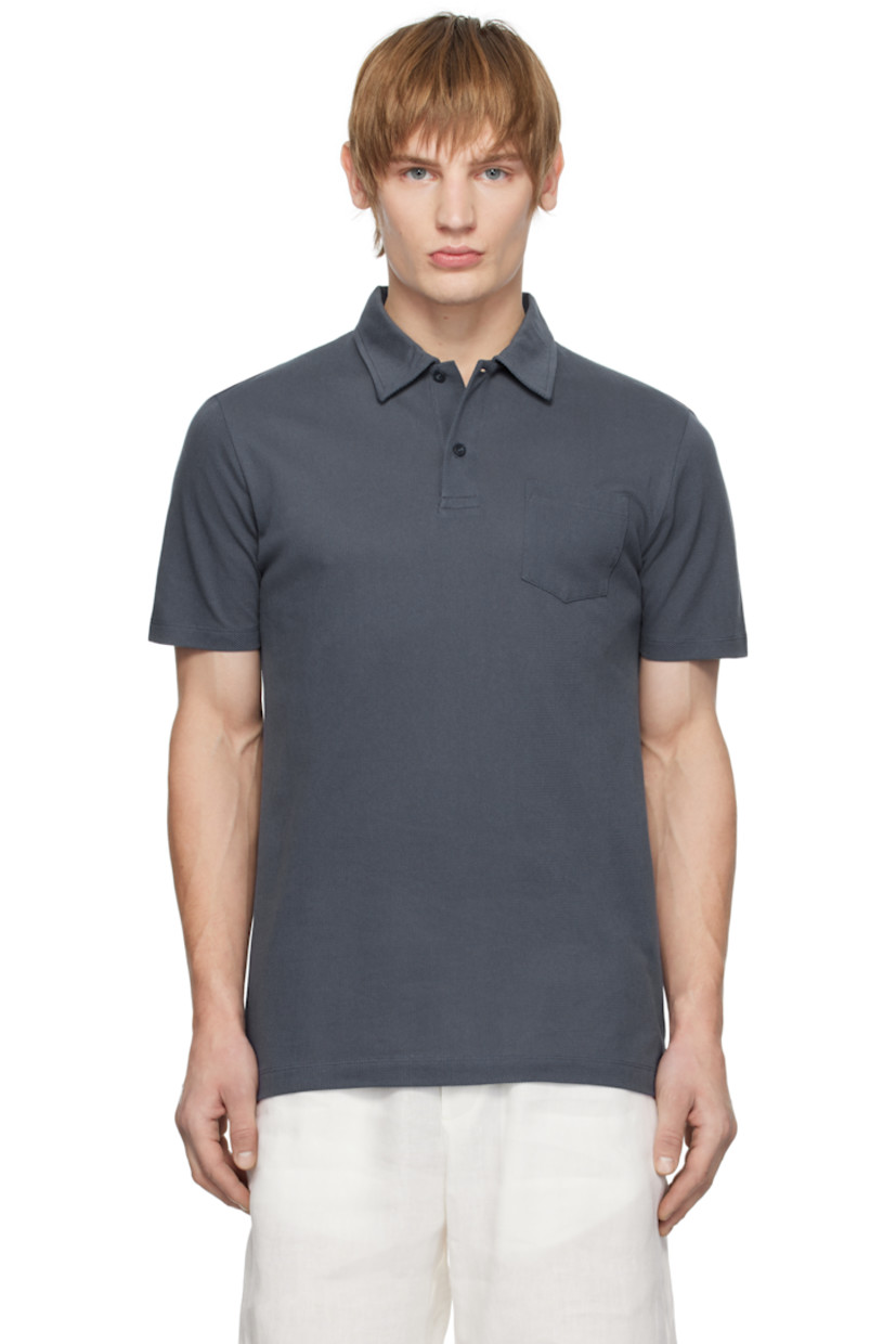Extra-long staple Supima cotton mesh polo. Lightweight and breathable.

· Slim-fit
· Spread collar
· Two-button placket
· Patch pocket
· Tennis-tail hem

Supplier color: Slate blue