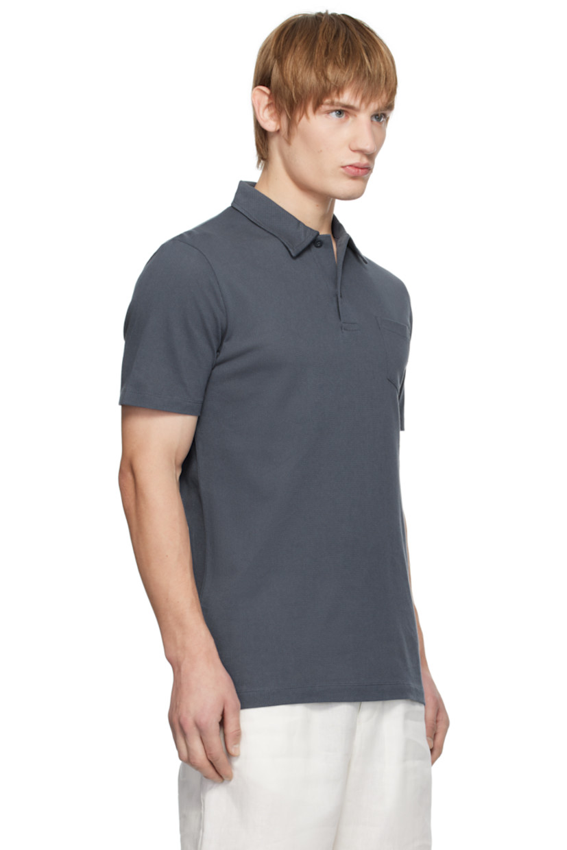 Extra-long staple Supima cotton mesh polo. Lightweight and breathable.

· Slim-fit
· Spread collar
· Two-button placket
· Patch pocket
· Tennis-tail hem

Supplier color: Slate blue