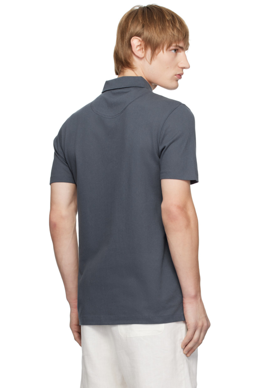 Extra-long staple Supima cotton mesh polo. Lightweight and breathable.

· Slim-fit
· Spread collar
· Two-button placket
· Patch pocket
· Tennis-tail hem

Supplier color: Slate blue