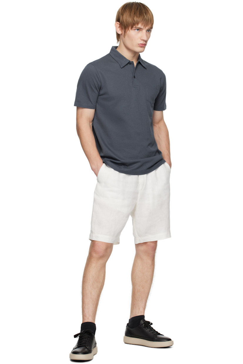 Extra-long staple Supima cotton mesh polo. Lightweight and breathable.

· Slim-fit
· Spread collar
· Two-button placket
· Patch pocket
· Tennis-tail hem

Supplier color: Slate blue