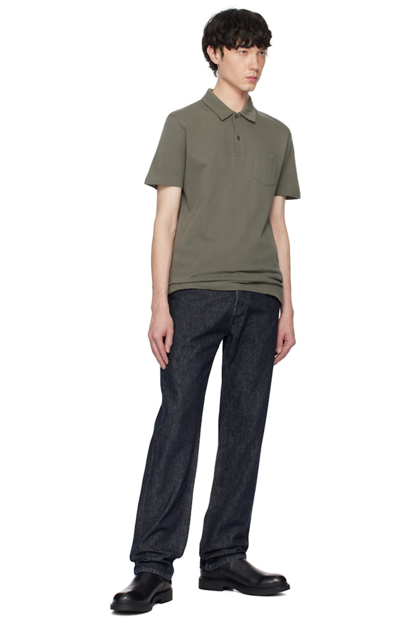 Lightweight extra-long staple supima cotton mesh polo. 

· Spread collar
· Two-button placket
· Patch pocket
· Vented side seams

Supplier color: Khaki