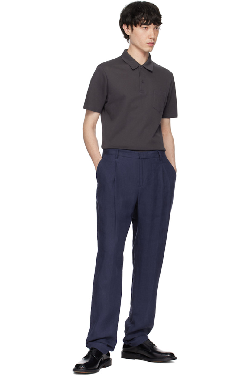 Extra-long staple Supima cotton mesh polo. Lightweight and breathable.

· Slim-fit
· Spread collar
· Two-button placket
· Patch pocket
· Tennis-tail hem

Supplier color: Charcoal