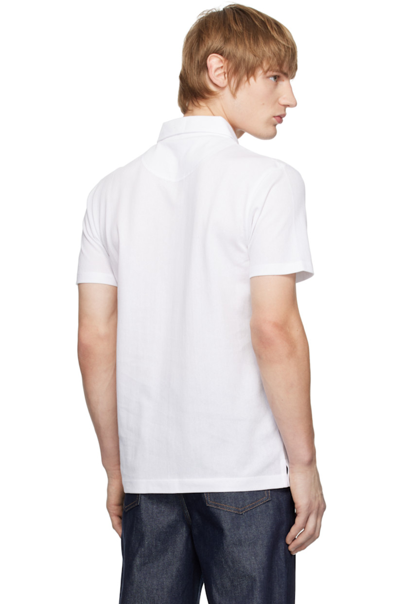 Extra-long staple Supima cotton mesh polo. Lightweight and breathable.

· Slim-fit
· Spread collar
· Two-button placket
· Patch pocket
· Tennis-tail hem

Supplier color: White
