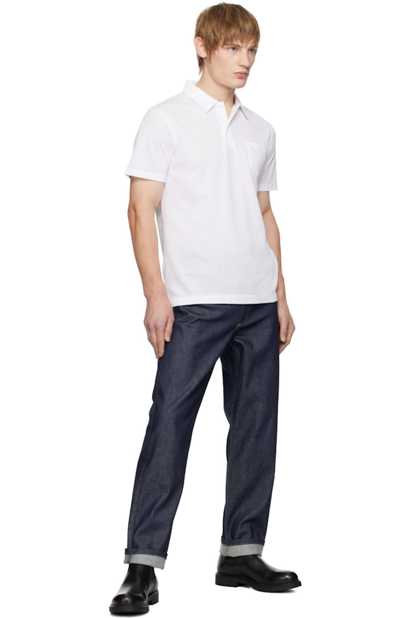 Extra-long staple Supima cotton mesh polo. Lightweight and breathable.

· Slim-fit
· Spread collar
· Two-button placket
· Patch pocket
· Tennis-tail hem

Supplier color: White