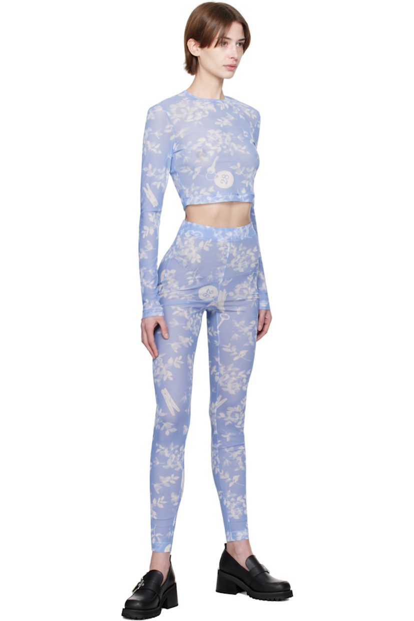 Semi-sheer stretch polyester mesh leggings.

· Graphic pattern throughout
· Elasticized waistband

Supplier color: Multi light blue