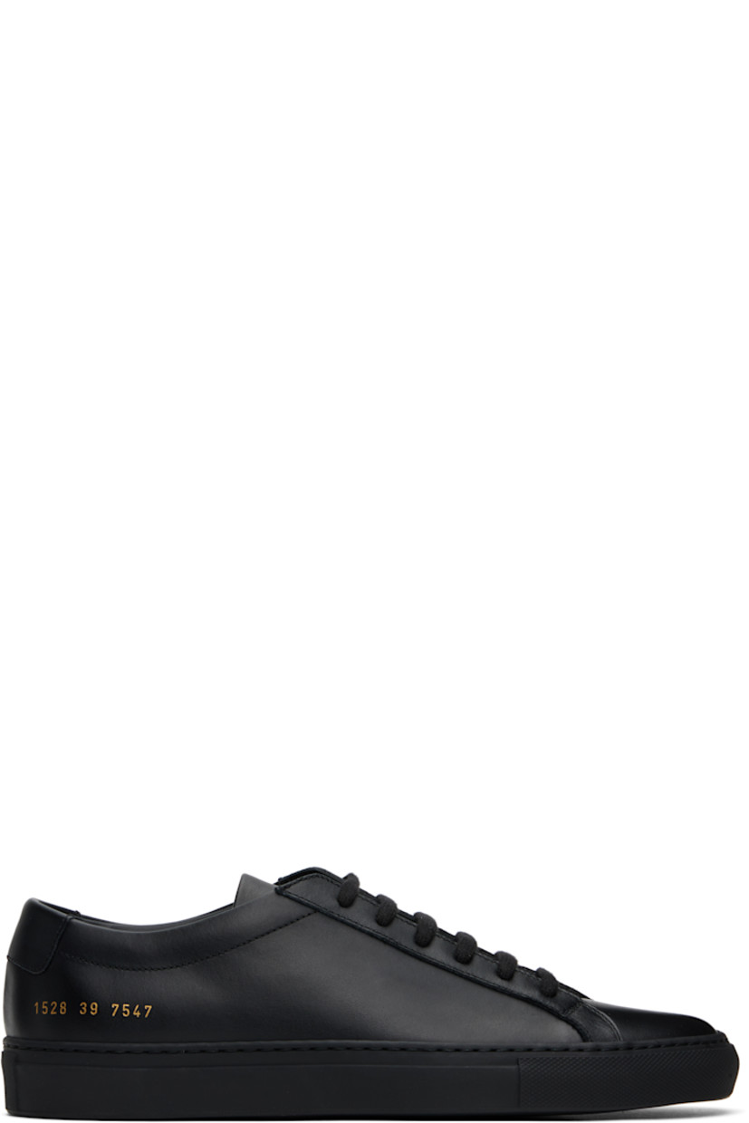Low-top buffed leather sneakers in black.

· Lace-up closure
· Padded tongue and collar
· Signature series stamp at outer side
· Buffed leather and suede lining
· Treaded rubber sole

Supplier color: Black