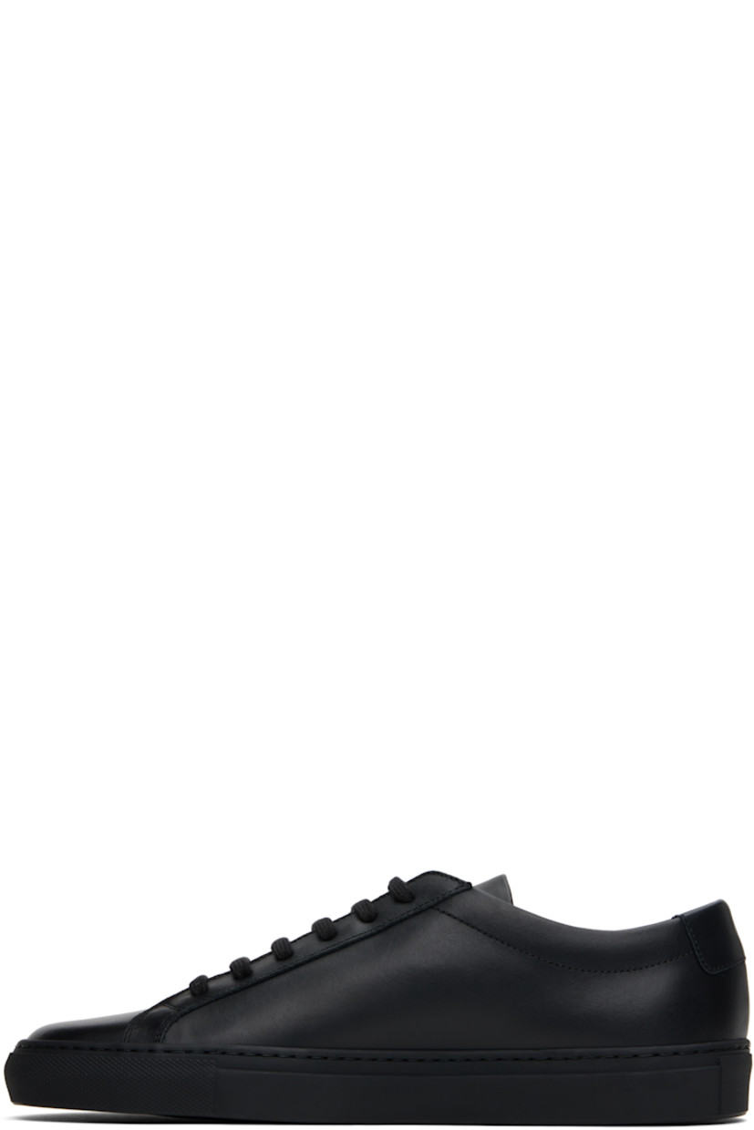Low-top buffed leather sneakers in black.

· Lace-up closure
· Padded tongue and collar
· Signature series stamp at outer side
· Buffed leather and suede lining
· Treaded rubber sole

Supplier color: Black