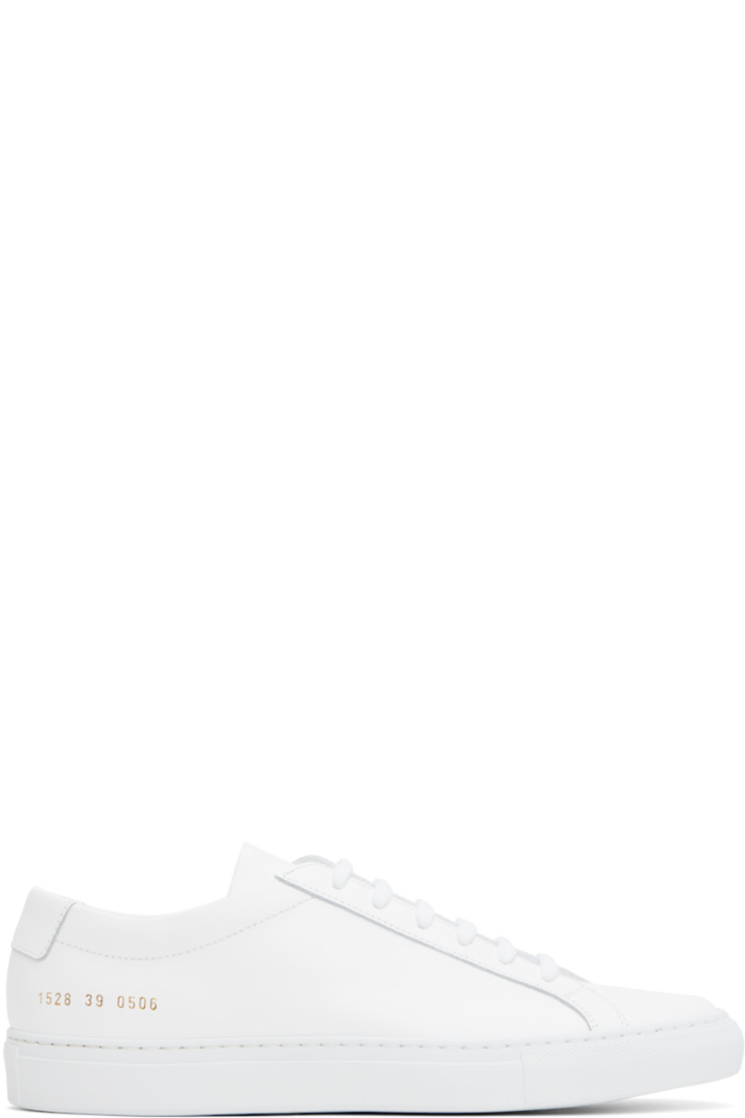 Low-top buffed leather sneakers in white.

· Lace-up closure
· Padded tongue and collar
· Signature series stamp at outer side
· Buffed leather and suede lining
· Treaded rubber sole

Supplier color: White
