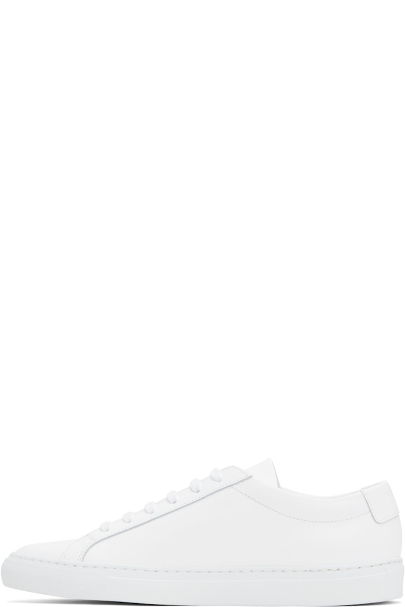 Low-top buffed leather sneakers in white.

· Lace-up closure
· Padded tongue and collar
· Signature series stamp at outer side
· Buffed leather and suede lining
· Treaded rubber sole

Supplier color: White