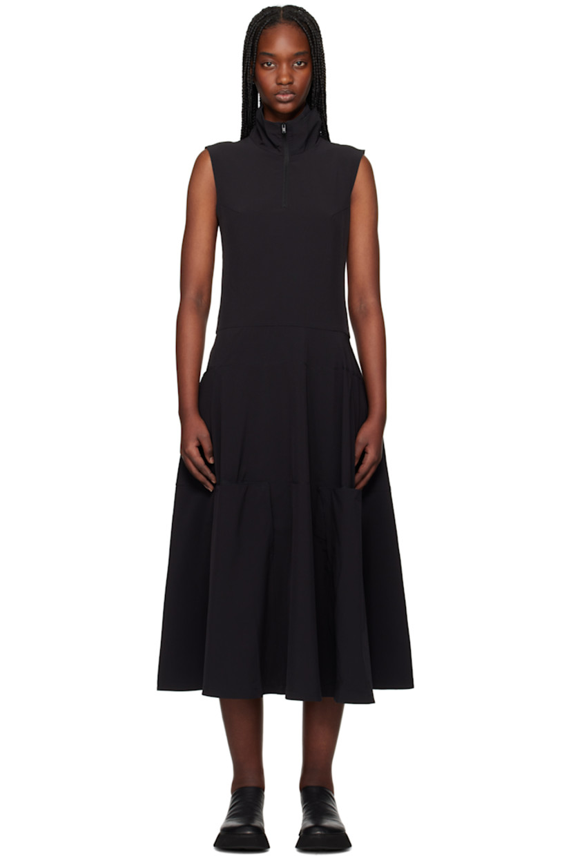 Stretch recycled polyester jersey midi dress. Press-stud vents and mesh underlays throughout. 

· Paneled construction 
· Stand collar  
· Half-zip closure
· Darts at chest
· Zip closure at side seam 
· Logo bonded at back collar 

Supplier color: Black