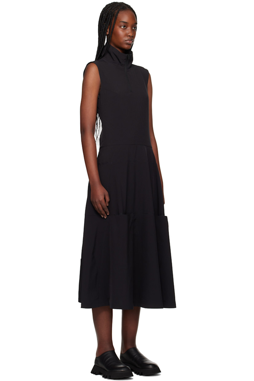 Stretch recycled polyester jersey midi dress. Press-stud vents and mesh underlays throughout. 

· Paneled construction 
· Stand collar  
· Half-zip closure
· Darts at chest
· Zip closure at side seam 
· Logo bonded at back collar 

Supplier color: Black