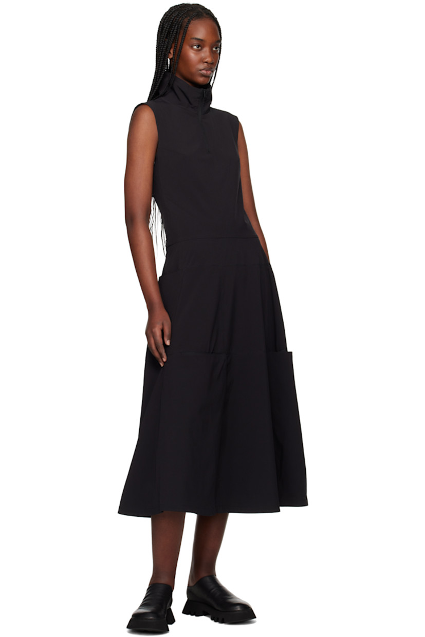 Stretch recycled polyester jersey midi dress. Press-stud vents and mesh underlays throughout. 

· Paneled construction 
· Stand collar  
· Half-zip closure
· Darts at chest
· Zip closure at side seam 
· Logo bonded at back collar 

Supplier color: Black