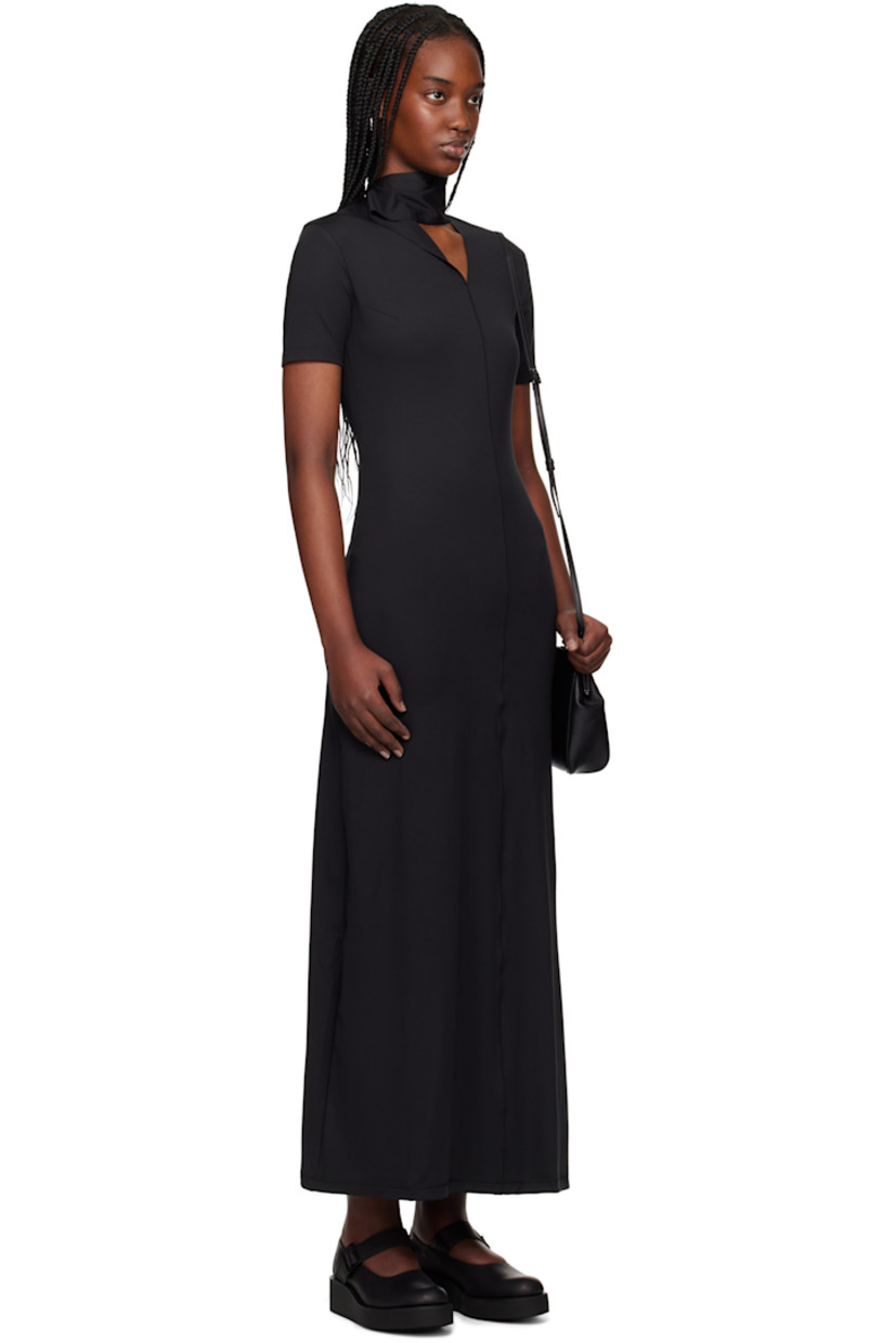 Stretch recycled polyester jersey maxi dress.

· Press-stud fastening and stripes at mock neck
· Offset V-neck 
· Darts at chest
· Central seam at front and back 
· Vented hem

Supplier color: Black