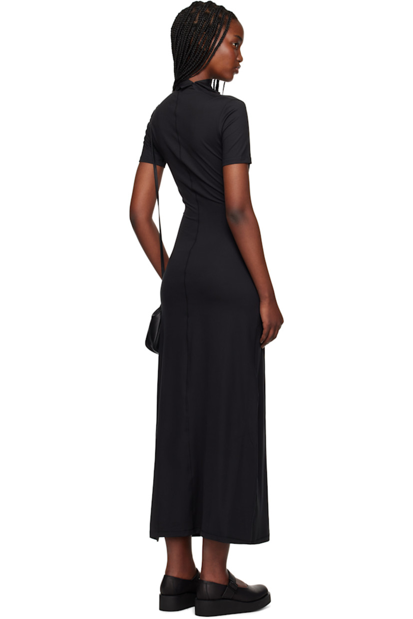 Stretch recycled polyester jersey maxi dress.

· Press-stud fastening and stripes at mock neck
· Offset V-neck 
· Darts at chest
· Central seam at front and back 
· Vented hem

Supplier color: Black