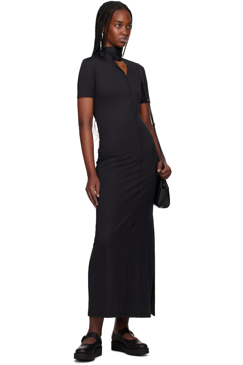 Stretch recycled polyester jersey maxi dress.

· Press-stud fastening and stripes at mock neck
· Offset V-neck 
· Darts at chest
· Central seam at front and back 
· Vented hem

Supplier color: Black