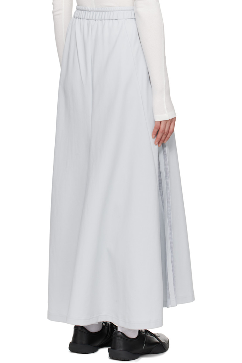 Loose-fit nylon jersey maxi skirt. 

· Drawstring at elasticized waistband
· Two-pocket styling
· Logo bonded at front
· Sheer mesh stripes at side seam

Supplier color: Grey