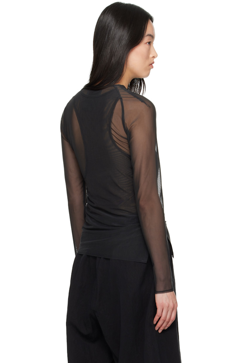 Slim-fit stretch recycled polyester mesh T-shirt.

· Layered construction
· Crewneck 
· Elasticized hem and cuffs
· Vent at side seams

Supplier color: Black