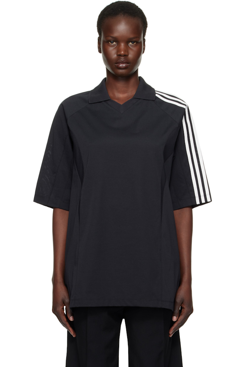 Cotton- and recycled-polyester blend jersey polo. 

· Paneled construction
· Spread collar at rib-knit V-neck
· Raglan sleeves
· Stripes and logo flag at sleeve

Supplier color: Black