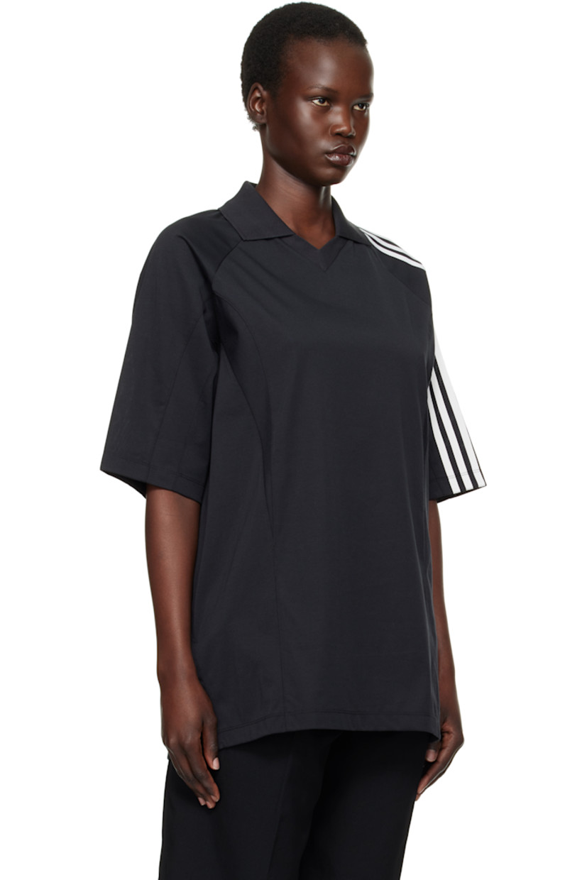 Cotton- and recycled-polyester blend jersey polo. 

· Paneled construction
· Spread collar at rib-knit V-neck
· Raglan sleeves
· Stripes and logo flag at sleeve

Supplier color: Black