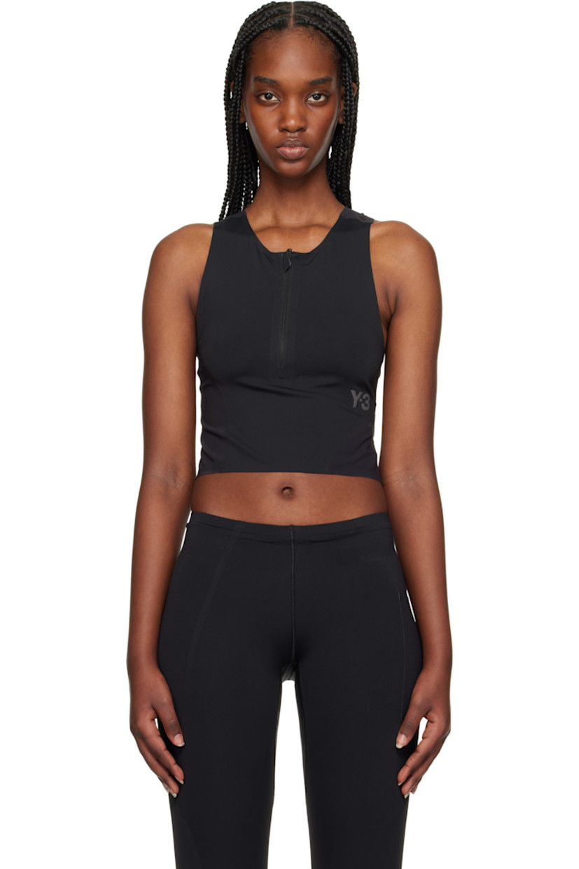 Stretch nylon jersey sport top. 

· Scoop neck
· Half-zip closure
· Logo bonded at front and back
· Cutout at modified racer back

Supplier color: Black