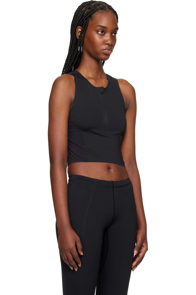 Stretch nylon jersey sport top. 

· Scoop neck
· Half-zip closure
· Logo bonded at front and back
· Cutout at modified racer back

Supplier color: Black