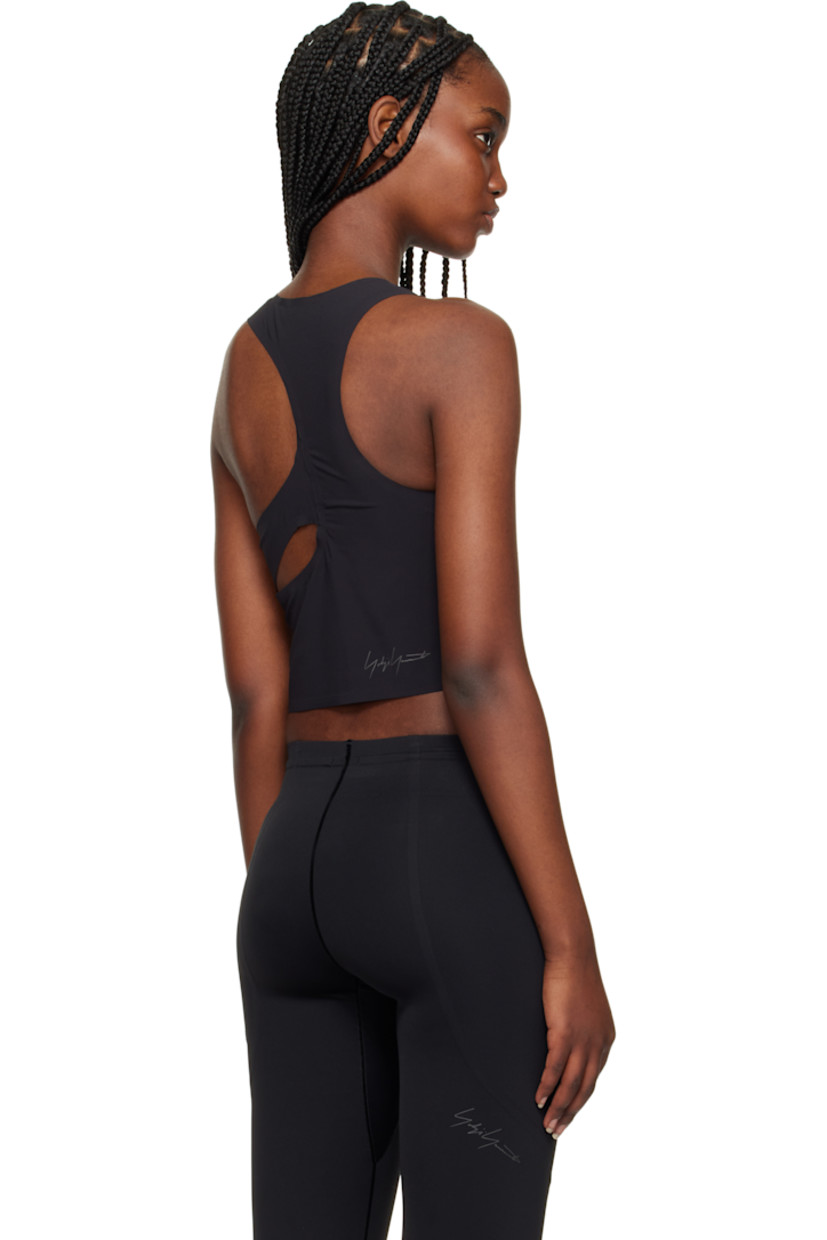 Stretch nylon jersey sport top. 

· Scoop neck
· Half-zip closure
· Logo bonded at front and back
· Cutout at modified racer back

Supplier color: Black