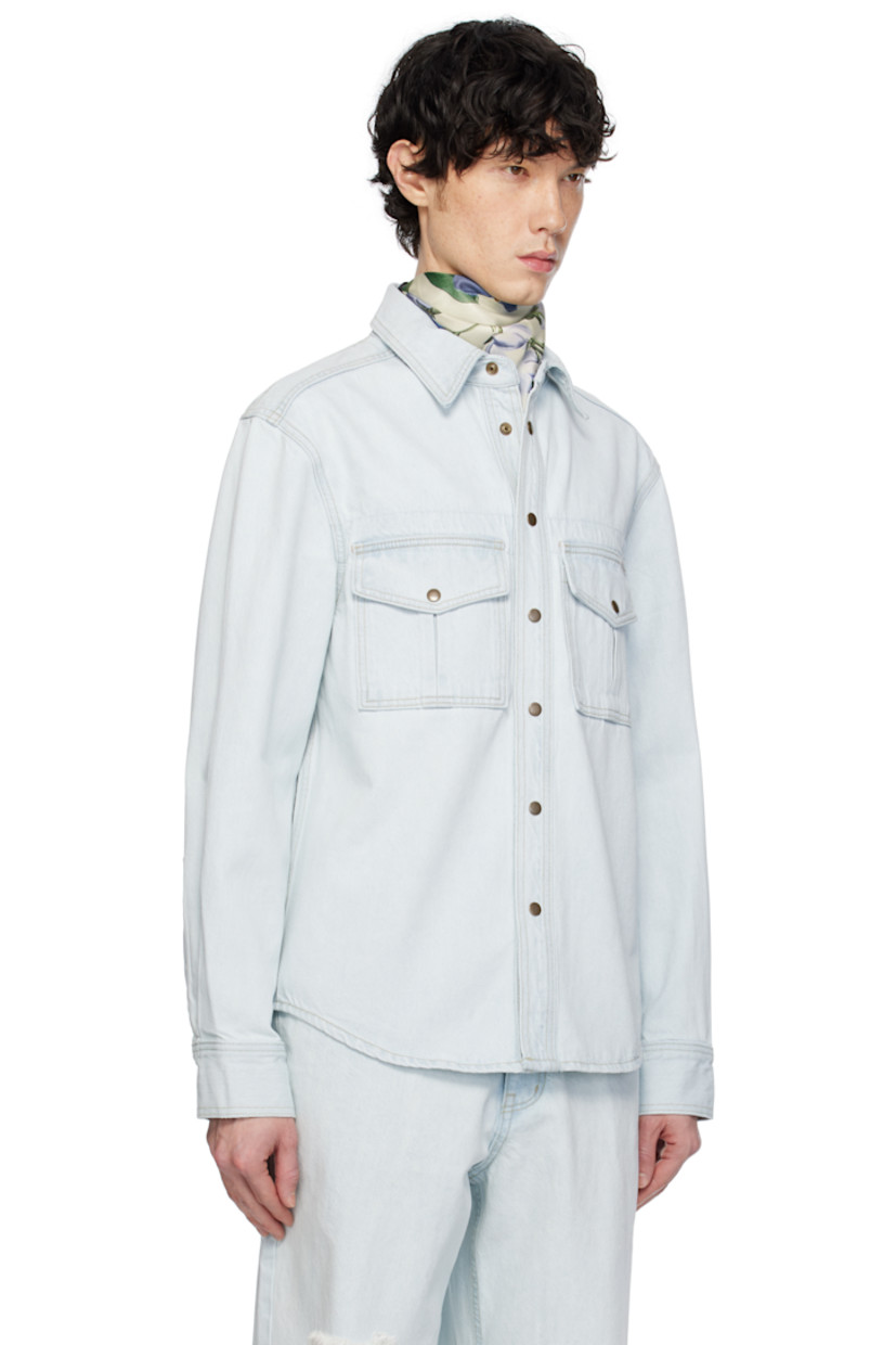 Non-stretch denim jacket. Fading throughout.

· Spread collar
· Press-stud closure
· Flap pockets
· Logo patch at chest
· Shirttail hem
· Press-stud barrel cuffs
· Contrast stitching in yellow

Supplier color: Light indigo