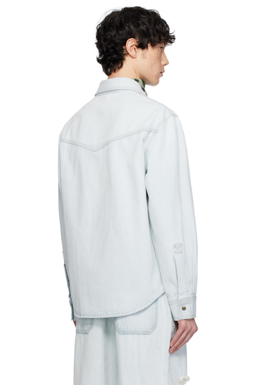 Non-stretch denim jacket. Fading throughout.

· Spread collar
· Press-stud closure
· Flap pockets
· Logo patch at chest
· Shirttail hem
· Press-stud barrel cuffs
· Contrast stitching in yellow

Supplier color: Light indigo
