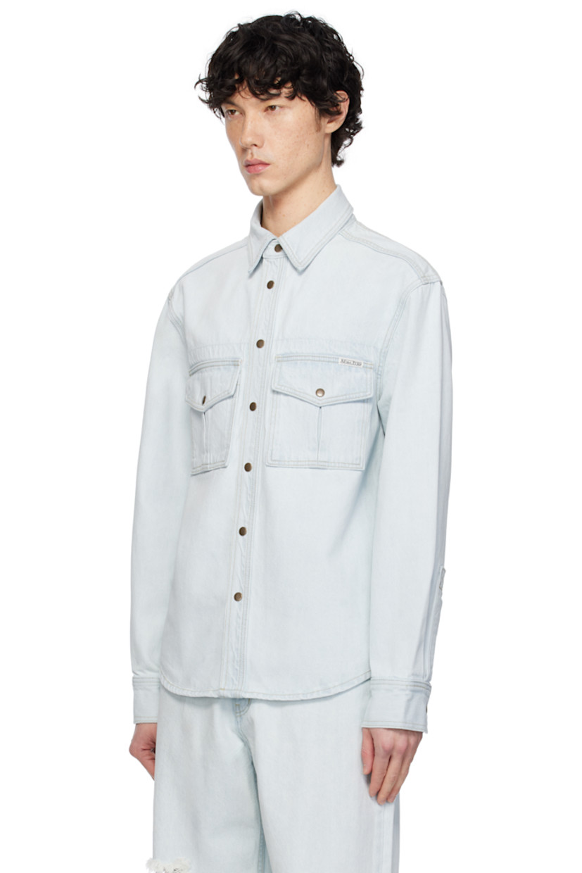 Non-stretch denim jacket. Fading throughout.

· Spread collar
· Press-stud closure
· Flap pockets
· Logo patch at chest
· Shirttail hem
· Press-stud barrel cuffs
· Contrast stitching in yellow

Supplier color: Light indigo