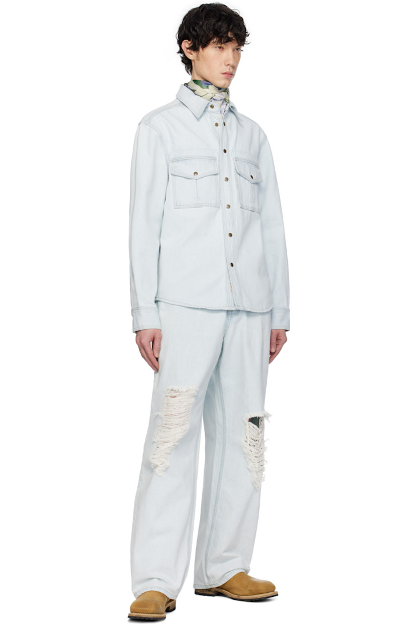 Non-stretch denim jacket. Fading throughout.

· Spread collar
· Press-stud closure
· Flap pockets
· Logo patch at chest
· Shirttail hem
· Press-stud barrel cuffs
· Contrast stitching in yellow

Supplier color: Light indigo