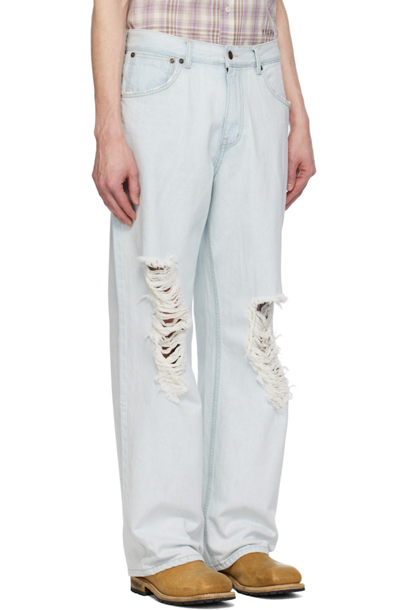 Non-stretch denim jeans. Fading and distressing throughout.

· Belt loops
· Five-pocket styling
· Zip-fly
· Logo patch at back waistband
· Contrast stitching in yellow

Supplier color: Light indigo
